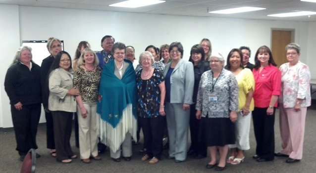 Assistant Secretary for Aging Kathy Greenlee (wearing blue shawl) with Title VI Program Directors.
