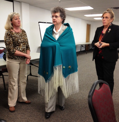 On May 17, 2012, the Tribes of Oklahoma honored Assistant Secretary for Aging Kathy Greenlee (in center) for her support of Title VI programs. (L to R) Brenda House, Title VI Director for Wyandotte Tribe; Rhonda Weaver, Title VI Director for Quapaw Tribe.