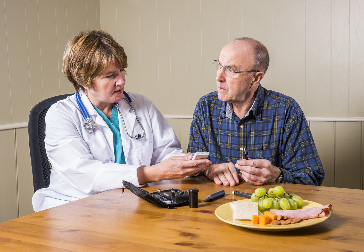 a doctor and older gentleman talking