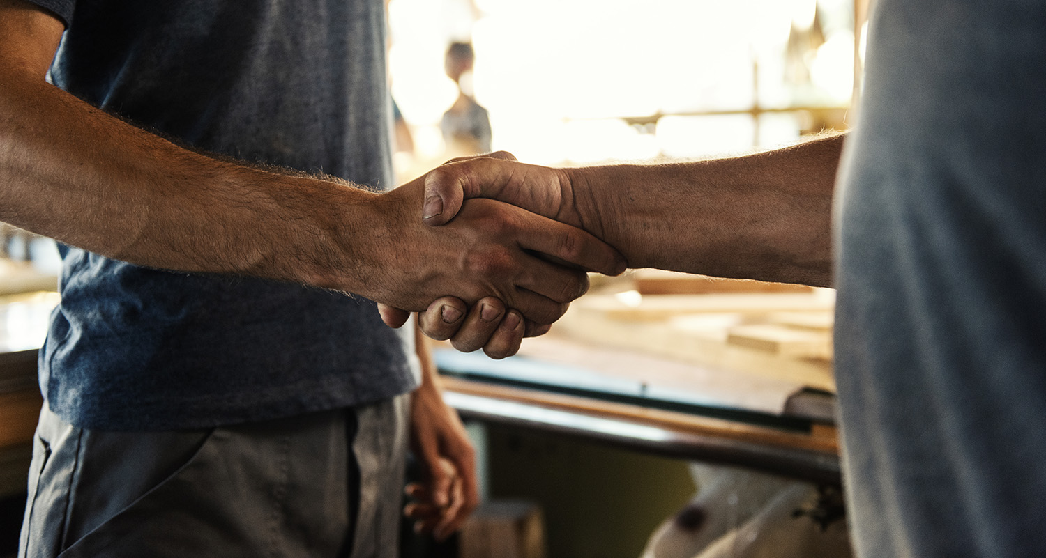 two people shaking hands